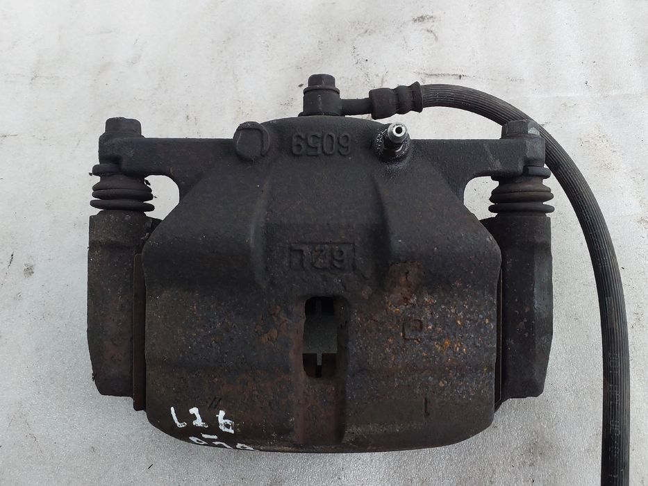 Pinça travão / maxila de travão frente esquerda NISSAN Qashqai/Qashqai