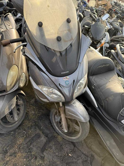 PIAGGIO X9 125 silnik części licznik gaźnik stelaż tył pompa kanapa