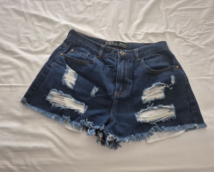 Calção ganga com rasgos