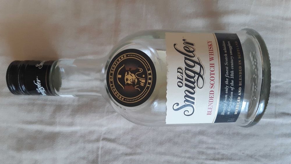 Бутылка с под виски.