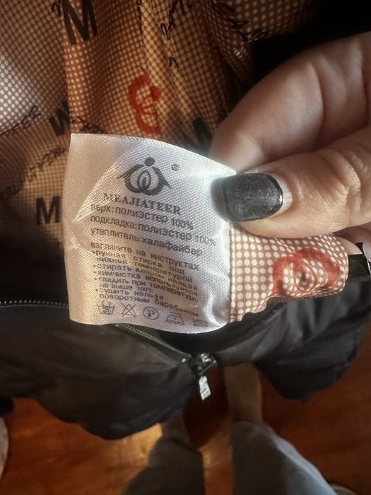 Пуховик нв дівчину