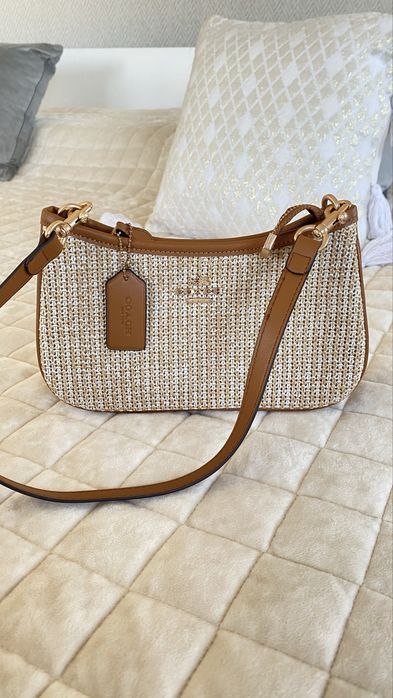 Bolsa Coach feminina em tecido tramado