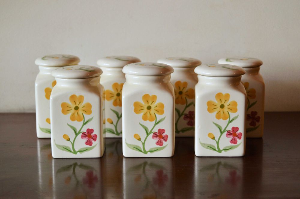 Set of 7 Ceramic Pots.