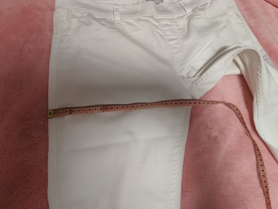 Białe spodnie 3/4 Clockhouse 40