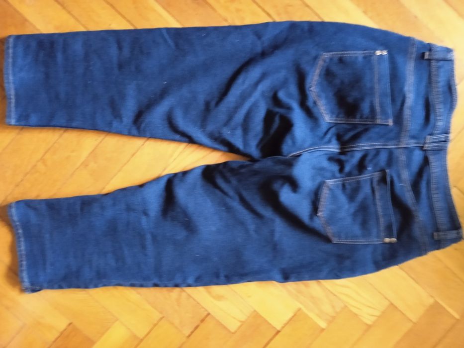 Jeansowe spodnie rybaczki 38