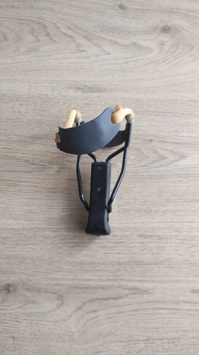 Fisga com apoio de braço