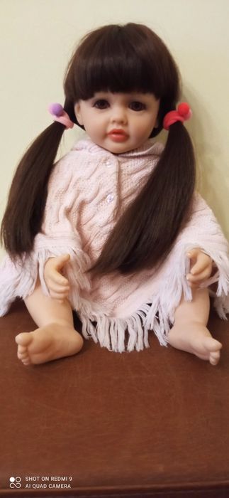 Реалістична лялька