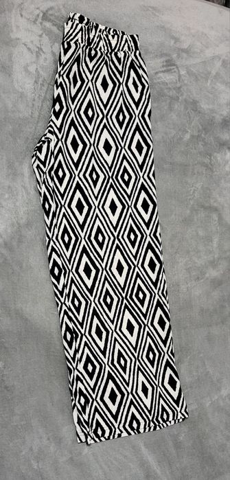 Eleganckie spodnie damskie L – czarno-biały wzór geometryczny, 1