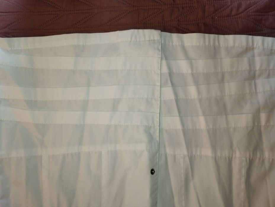 Білий халат на кнопках