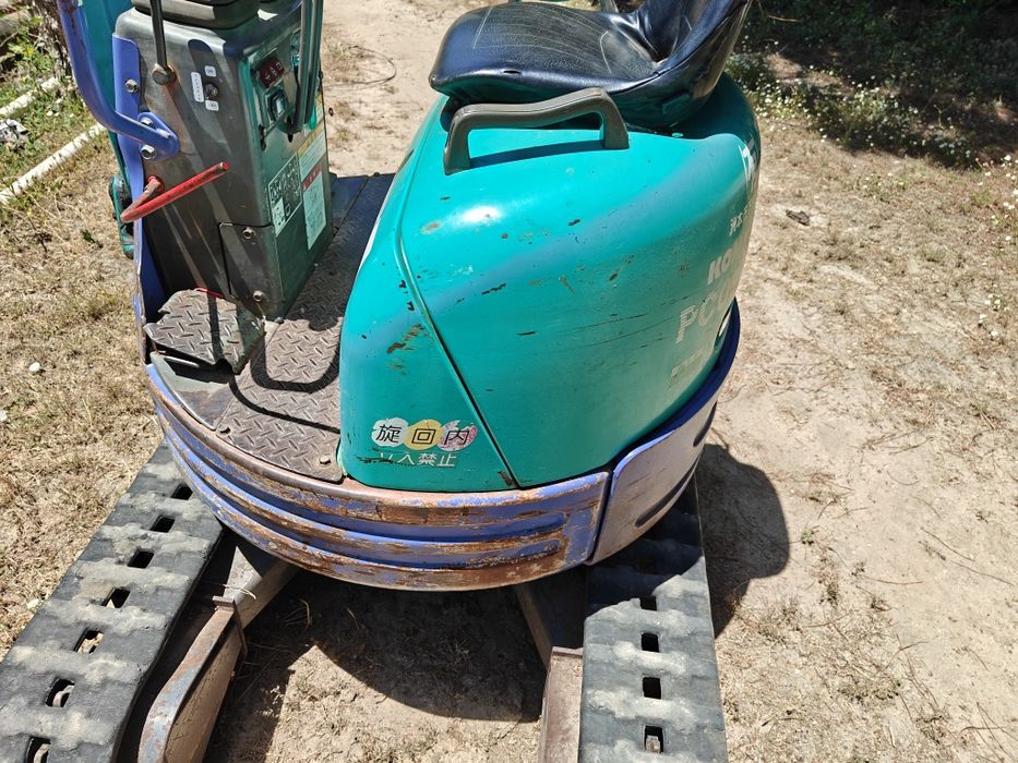 Mini giratória Komatsu profissional raio 0 motor yanmar