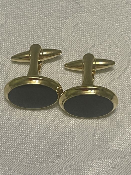 Запонки чоловічи