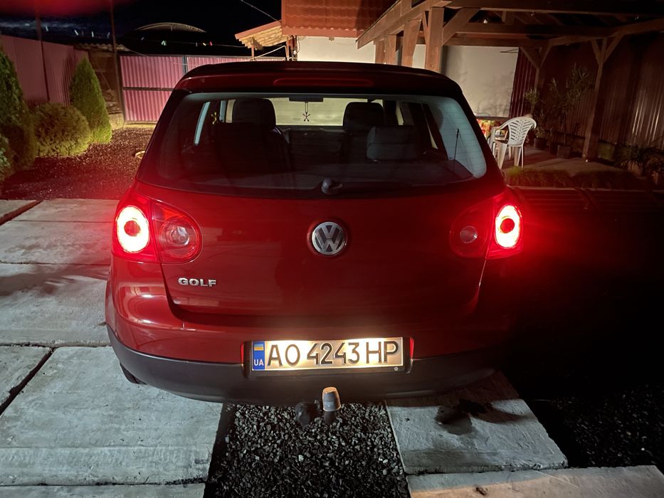 Volkswagen Golf . 1,4 mpi . 2003 рік. Червоний металік