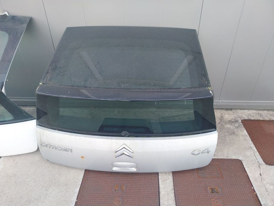 Tampa mala e para choques tras Citroën C4 coupe ano 2009