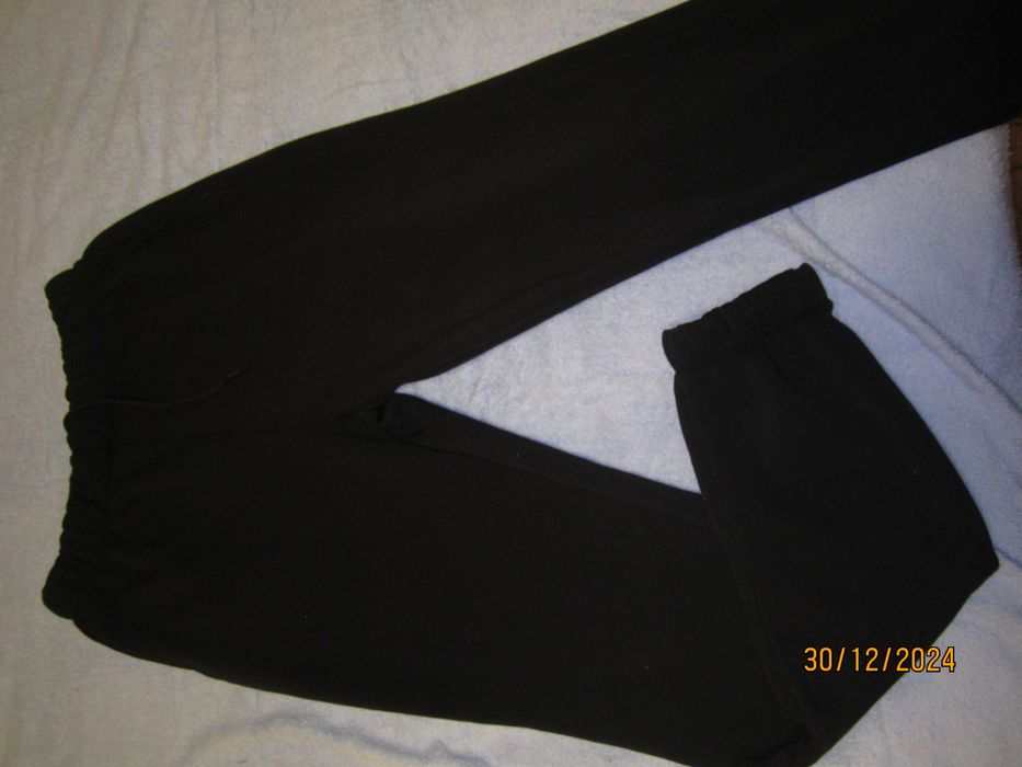 Продам теплые мужские штаны.