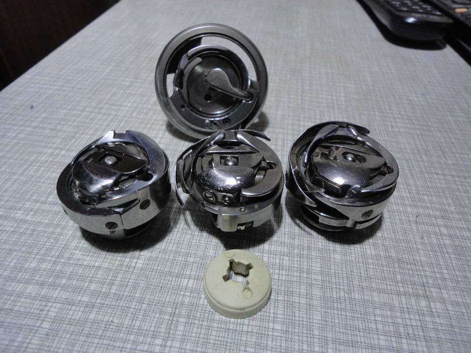 запчастини швейних машин , промислові  й побутові , різні  фірми