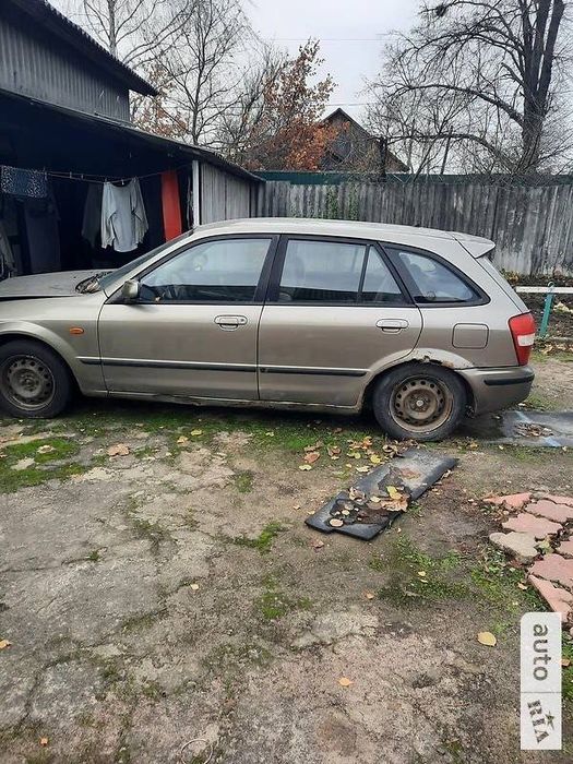 Мазда 323f 1999 року 1,6 бензин після дтп