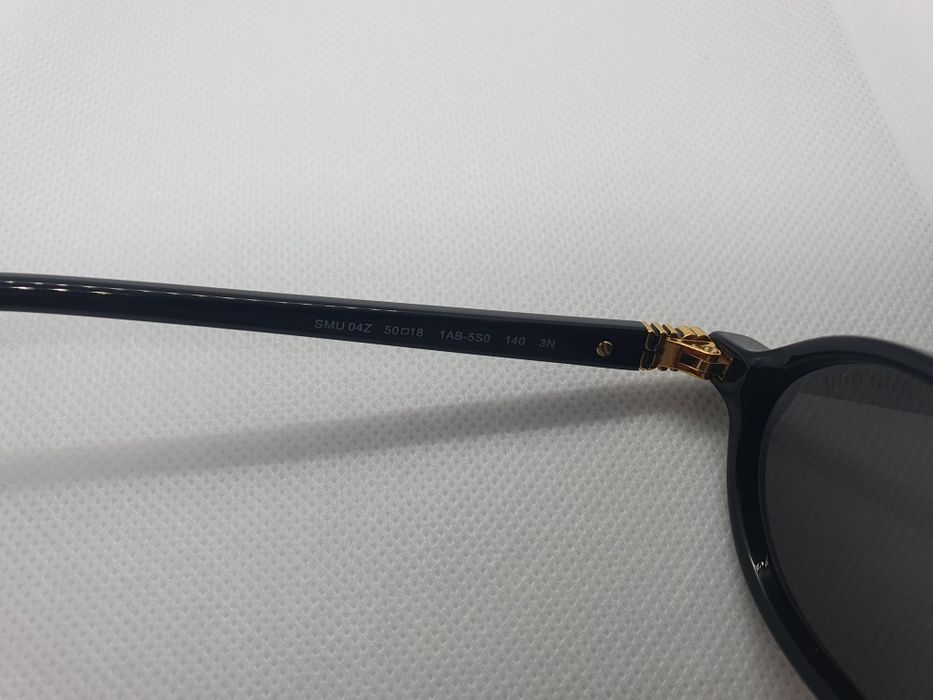 Miu Miu SMU04Z Black.