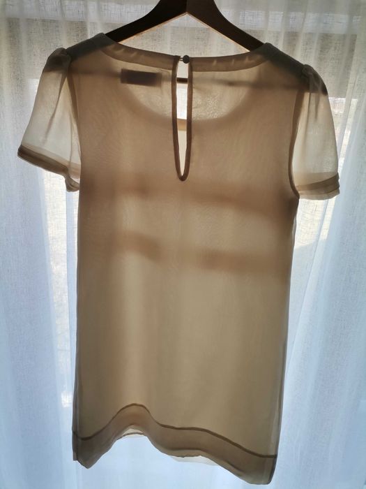 Delikatna sukienka z krótkim rękawem. Rozmiar S/XS