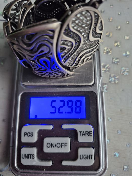 Срібний браслет з каміньцями