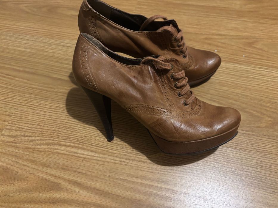 Sapatos com pouco uso