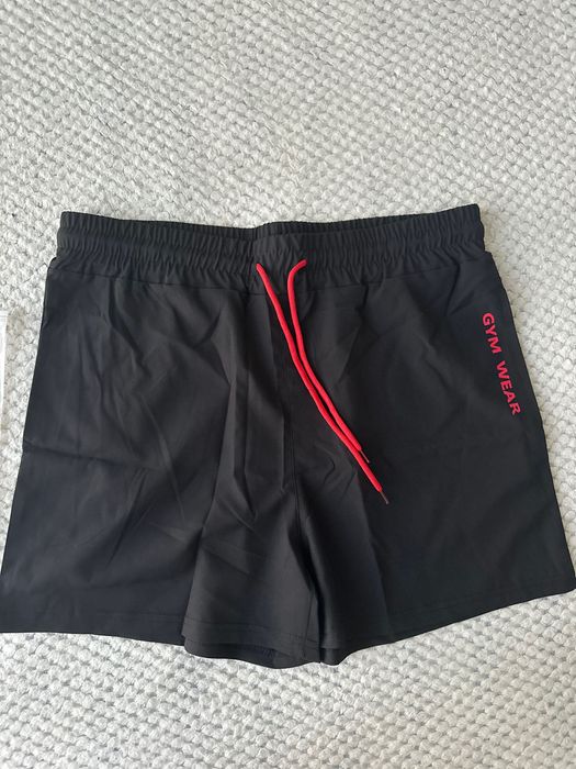 Нові спортивні чоловічі чорні шорти