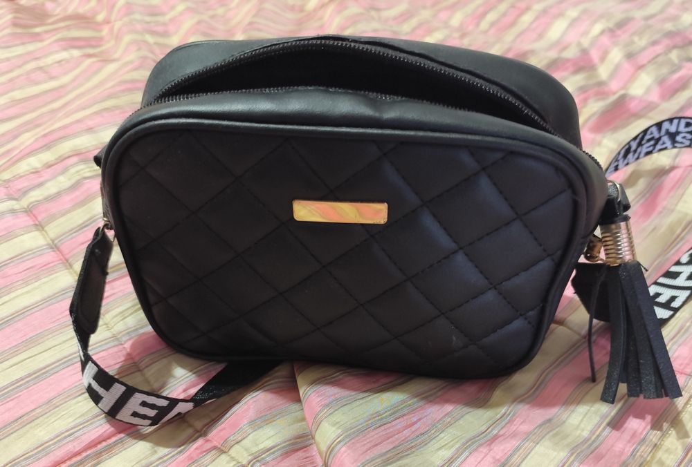 Mala a tiracolo preta