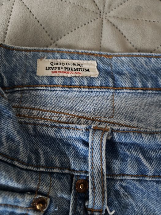 Niebieskie spodnie jeansowe męskie Levi's rozm 34