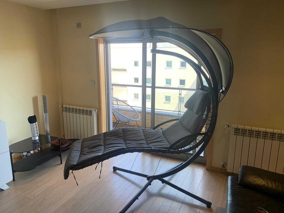 Espreguiçadeira oscilante