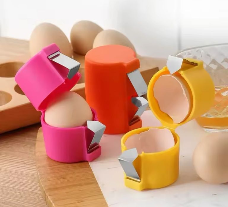 Urzadzenie do rozbijania skorupek jaj.