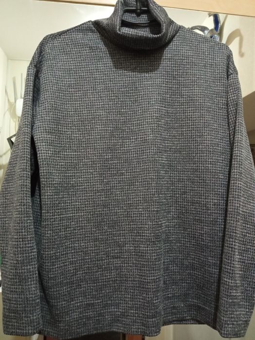 Сірий новий костюм 50р