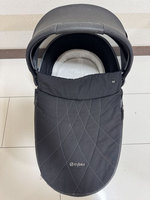 Cybex Mios Platinum Люлька з дощовиком чорна кроватка