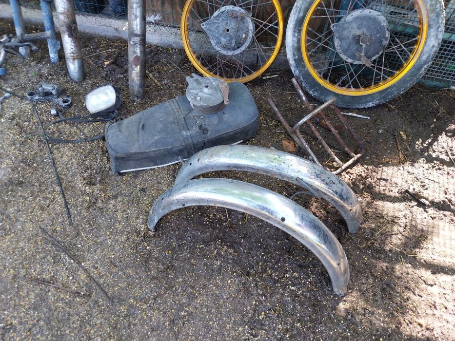 Lote de peças antigas de motorizada.