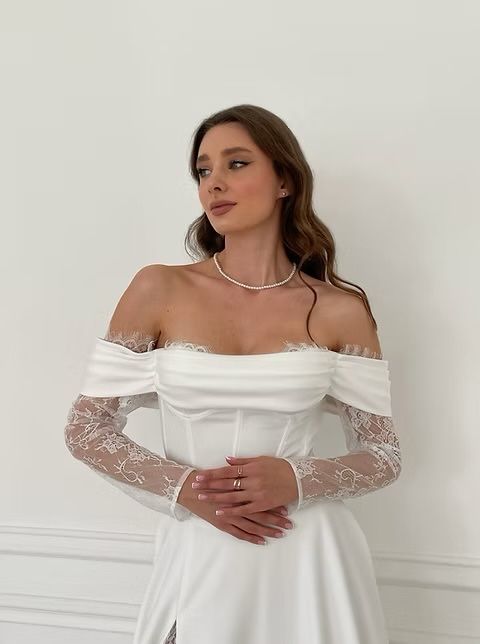 Весільна біла сукня