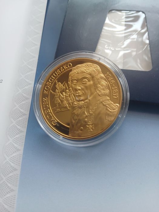 Numizmaty platerowane złotem. Tadeusz Kościuszko i Maria Skłodowska-Cu