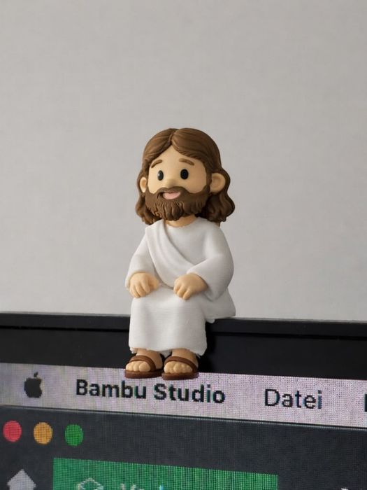 Mini Jesus sentado