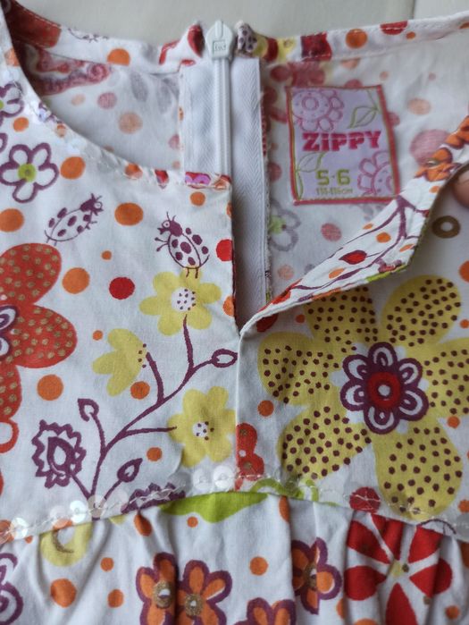 Túnica Zippy como nova