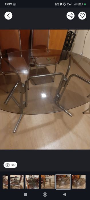 Mesa de vidro oval e 6 cadeiras