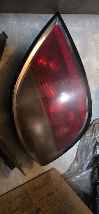 Farolim esquerdo OPEL Astra H Hatchback