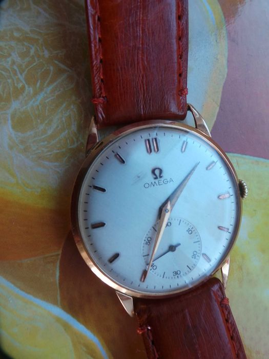 Złoty zegarek omega 18k