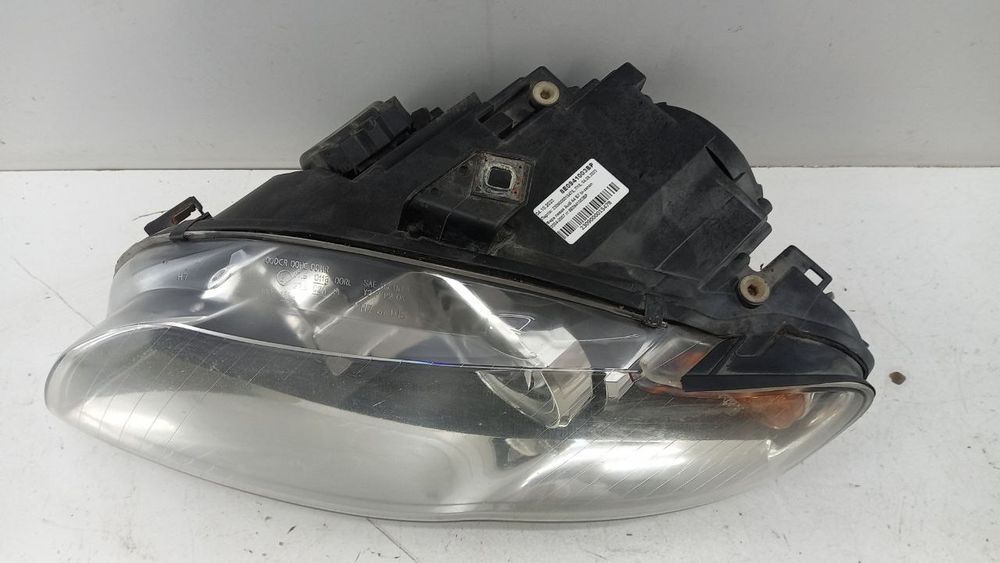 Фара левая Audi A4 B7 bi-xenon 2004-2007 8E0941003BP
