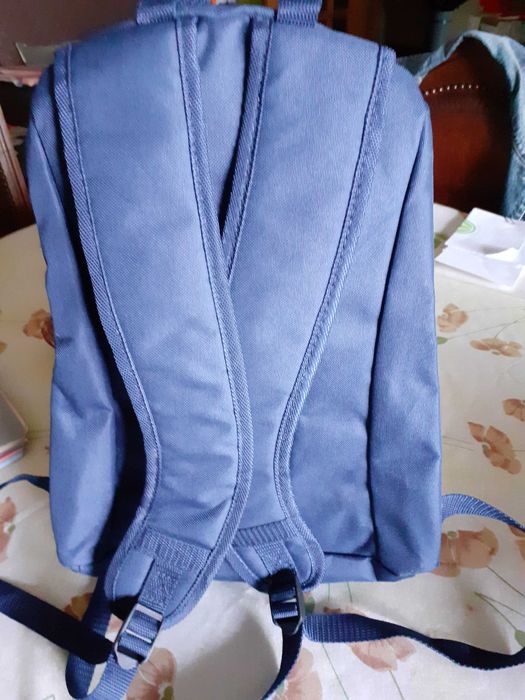 saco de viagem da marca Mike Davis e mochila Tui