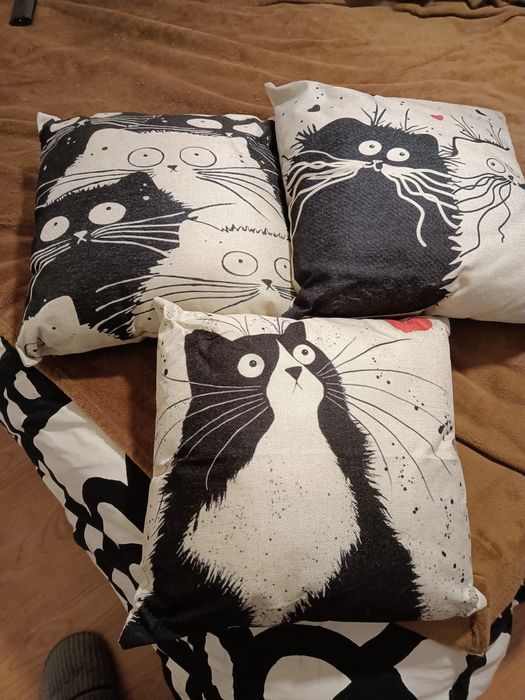 Almofadas com motivos de gatos