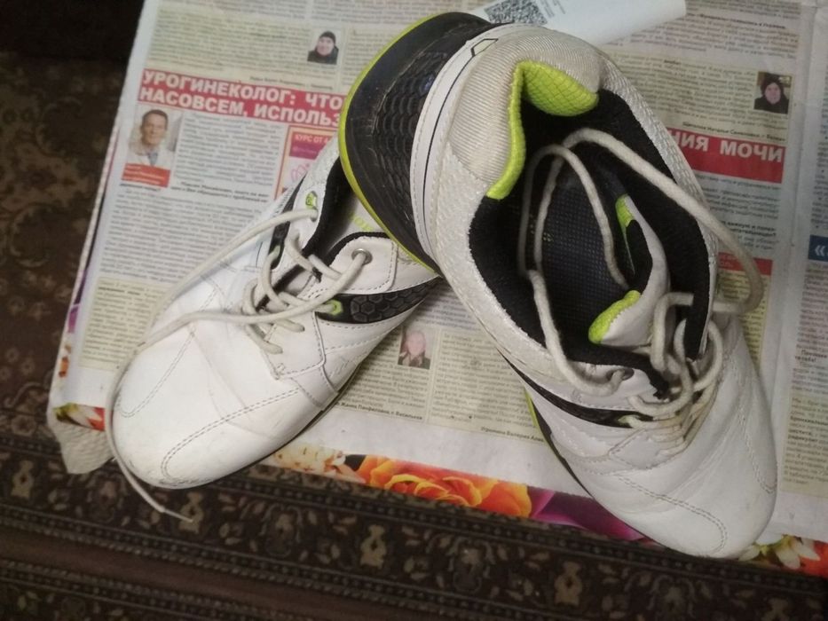 Продам  кожаные кроссовки .