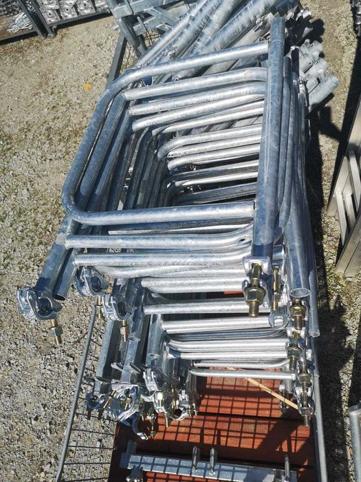 Rusztowanie fasadowe aluminiowe typ Plettac LEKKIE 10,3m x 12m nowe, podesty 3 m, kompletne