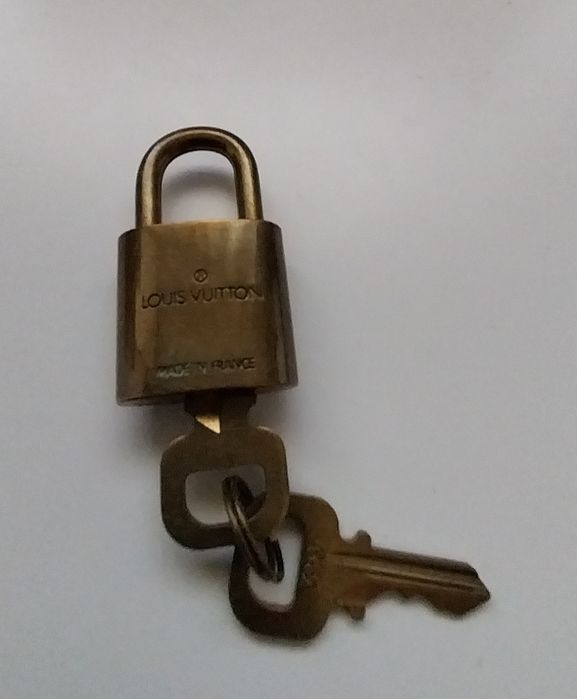 Aloquete antigo e original Louis Vuitton