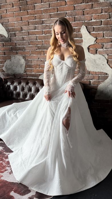 Nowiutka sukienka ślubna z francuskiej koronki