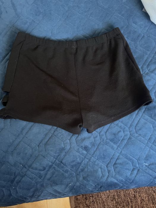 Vendo calções pretos femininos em ótimo estado, usados poucas vezes.