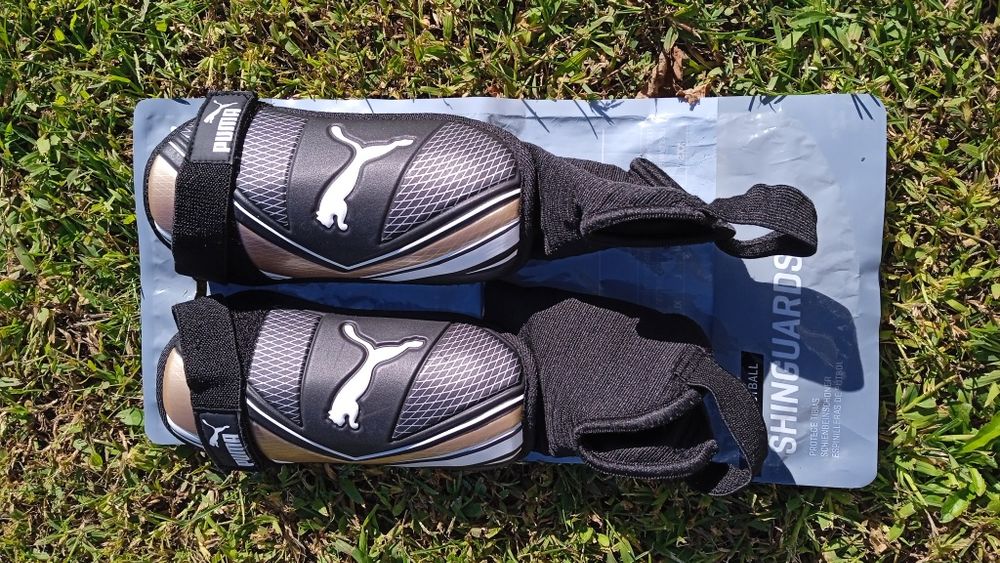 Chuteiras Puma + caneleiras