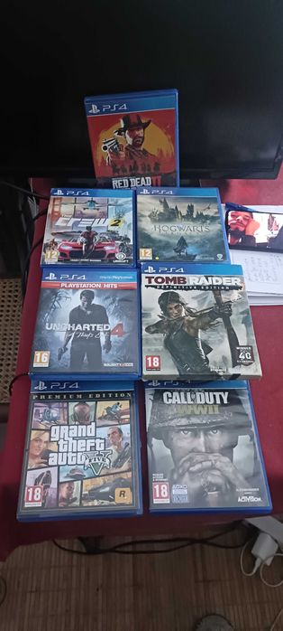 Ps4 com comando e jogos l.