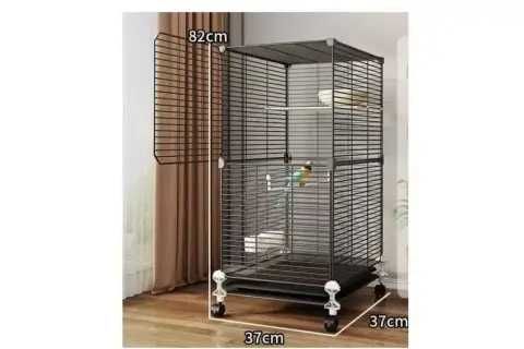 Металева клітка для птахів на колесах з аксесуарами 82х37х37см KP-82